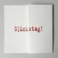 Preview: quadratische Geburtstagskarte: Glückstag!  (roter Druck)