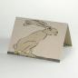 Preview: Recycling-Osterkarte: Hase der ein goldenes Ei legt