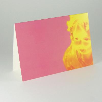 Weihnachtskarte: Engel (vor rosa Hintergrund)