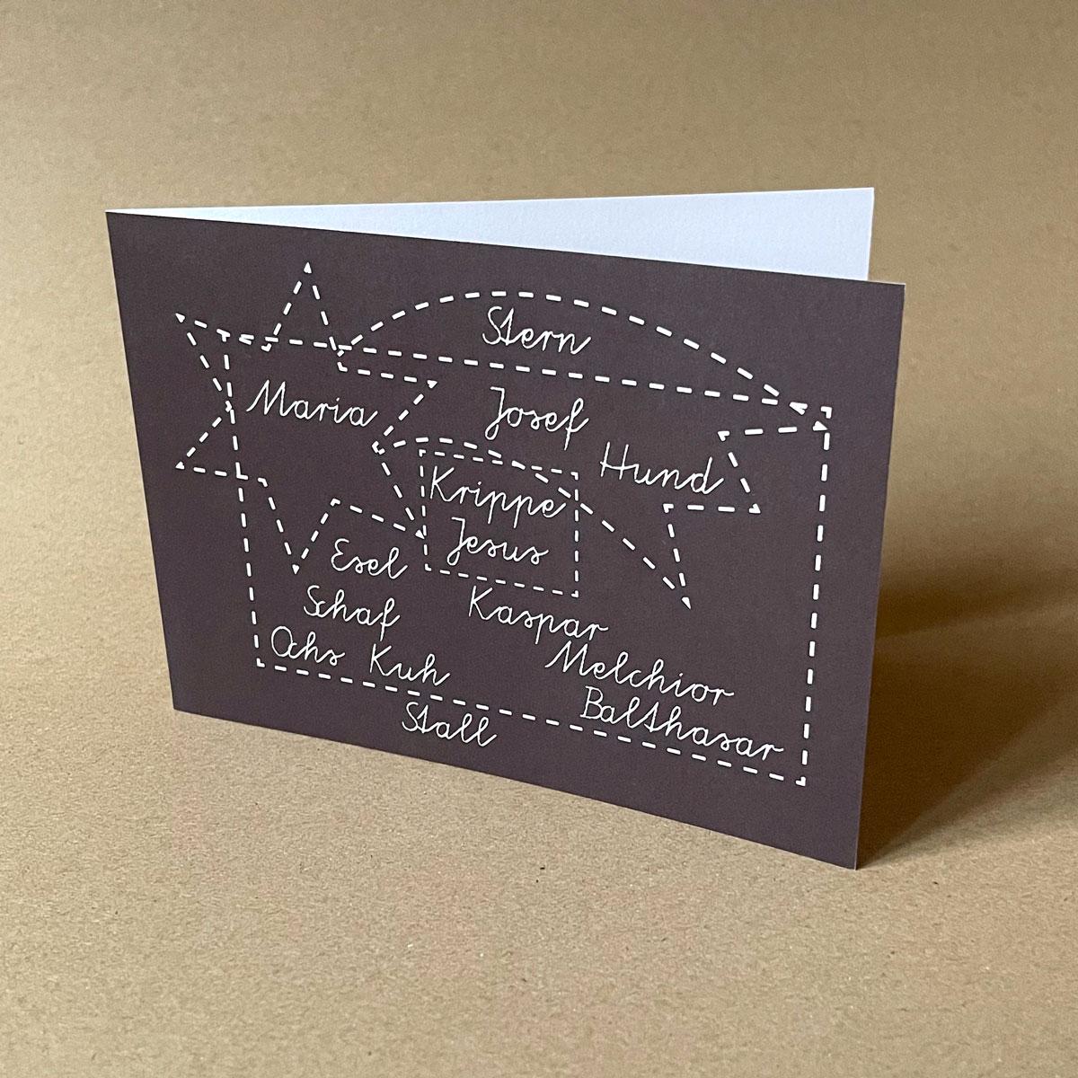 10er Set schwarze Weihnachtskarten mit roten Umschlägen: Schriftkrippe