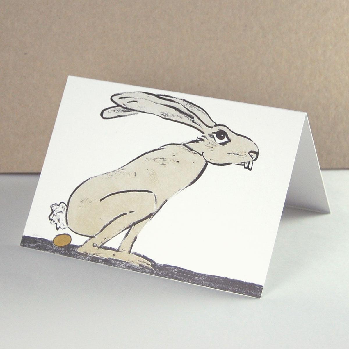 Künstler-Osterkarte: Hase der ein goldenes Ei legt